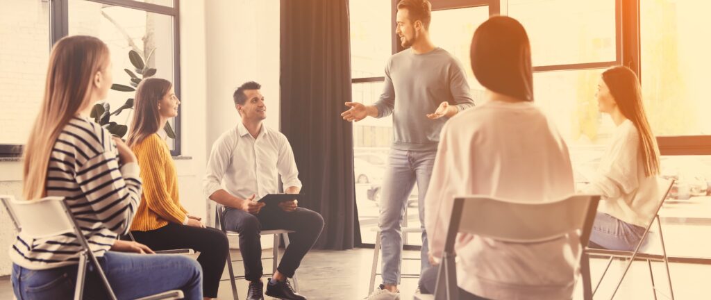 A group therapy session during springdale heights sober living 