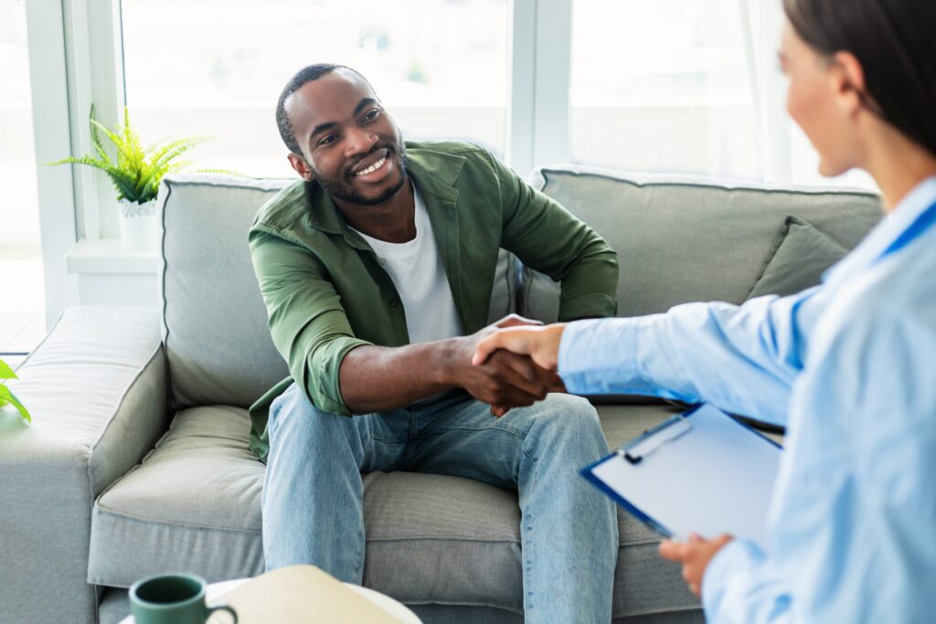 A man opens up during individual therapy at our hyde park sober living center.